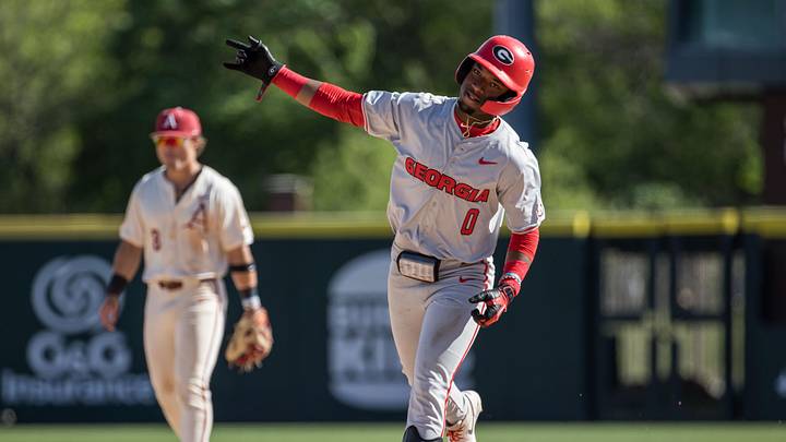 Apr 18, 2026; Fayetteville, AR, USA; Georgia Bulldogs infielder Ryan Wynn (0) points as he rounds the bases after a solo home run during the ninth inning against the Arkansas Razorbacks at Baum-Walker Stadium. Georgia won 26-14. Mandatory Credit: Brett Rojo-Imagn Images Apr 18, 2026; Fayetteville, AR, USA; Georgia Bulldogs infielder Ryan Wynn (0) points as he rounds the bases after a solo home run during the ninth inning against the Arkansas Razorbacks at Baum-Walker Stadium. Georgia won 26-14. Mandatory Credit: Brett Rojo-Imagn Images