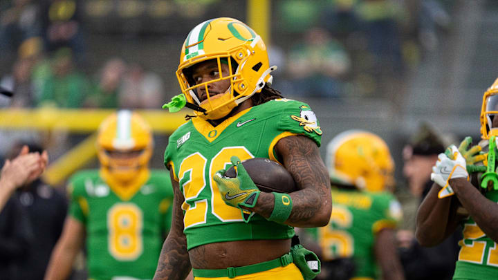 Oregon running back Jordan James carries the ball during warmups as the Oregon Ducks host the Maryland Terrapins at Autzen Stadium Saturday, Nov. 9, 2024 in Eugene, Ore.