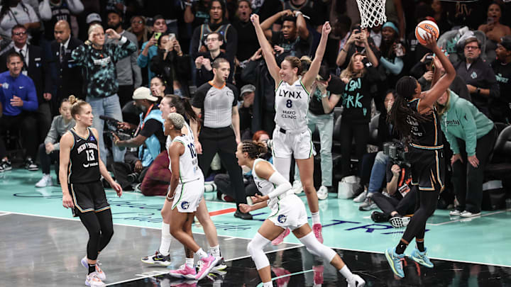 Oct 10, 2024; Brooklyn, New York, USA; The Minnesota Lynx celebrate after defeating the New York Liberty in overtime at Barclays Center. Mandatory Credit: Wendell Cruz-Imagn Images