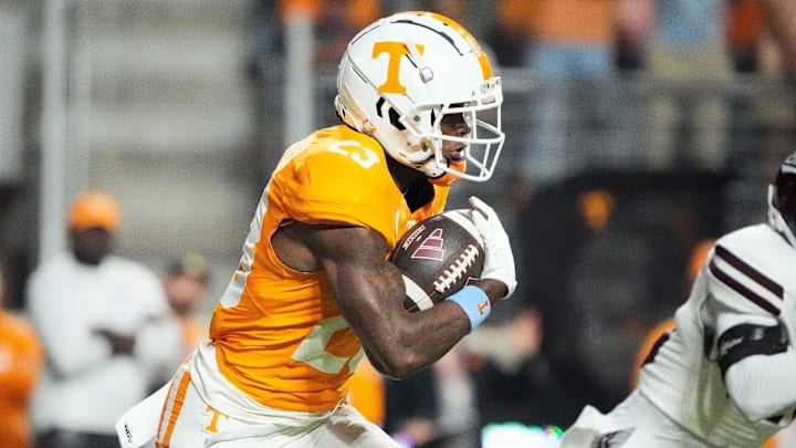 Nov 9, 2024; Knoxville, Tennessee, USA; Tennessee Volunteers defensive back Boo Carter (23) runs with the ball against the Mississippi State Bulldogs during the first half at Neyland Stadium. Mandatory Credit: Saul Young/USA TODAY Network via Imagn Images