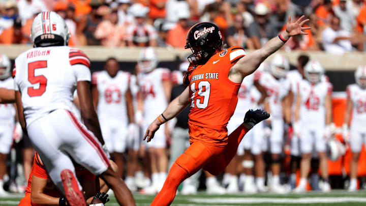 Oklahoma State's Logan Ward (19) kicks a field goal in the first half of the college football between the Oklahoma State University Cowboys and the Utah Utes at Boone Pickens Stadium in Stillwater, Okla., Saturday, Sept., 21, 2024. Oklahoma State's Logan Ward (19) kicks a field goal in the first half of the college football between the Oklahoma State University Cowboys and the Utah Utes at Boone Pickens Stadium in Stillwater, Okla., Saturday, Sept., 21, 2024.
