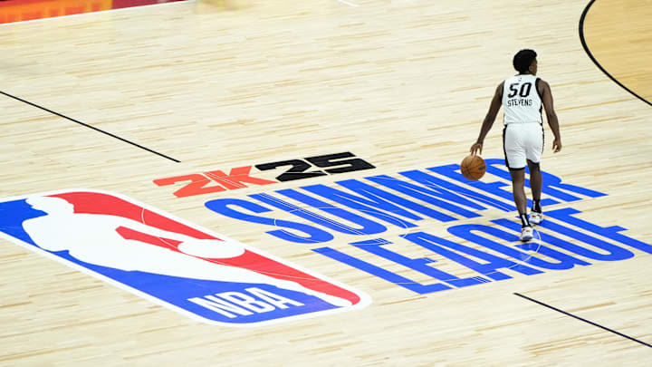 Jul 22, 2024; Las Vegas, NV, USA; Miami Heat guard Isaiah Stevens (50) dribbles the ball against the Memphis Grizzlies during the second half at Thomas & Mack Center. Mandatory Credit: Lucas Peltier-Imagn Images
