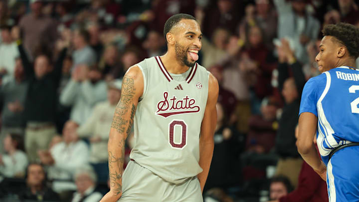 Jan 11, 2025; Starkville, Mississippi, USA; Mississippi State Bulldogs guard Claudell Harris Jr. (0) reacts after a three-point basket against the Kentucky Wildcats during the second half at Humphrey Coliseum. Mandatory Credit: Wesley Hale-Imagn Images