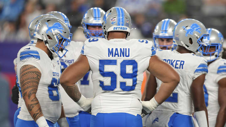 Aug 8, 2024; East Rutherford, New Jersey, USA;  Detroit Lions offensive tackle Giovanni Manu (59) in the huddle during the game against the New York Giants at MetLife Stadium. Mandatory Credit: Scott Rausenberger-Imagn Images