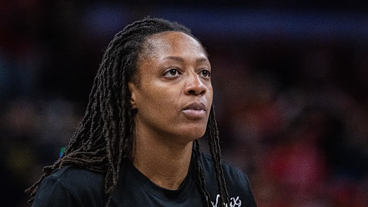 Sep 26, 2025; Indianapolis, Indiana, USA; Indiana Fever guard Kelsey Mitchell (0) looks on during game three against the Las Vegas Aces of the second round for the 2025 WNBA Playoffs at Gainbridge Fieldhouse. Mandatory Credit: Trevor Ruszkowski-Imagn Images