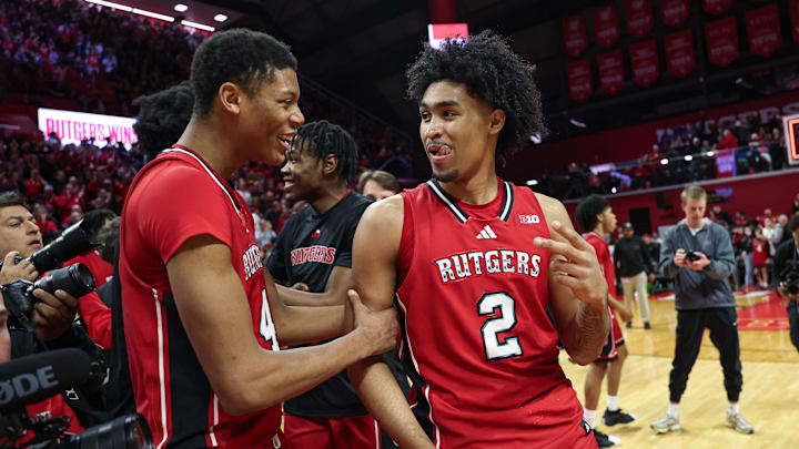 Dec 14, 2024; Piscataway, New Jersey, USA; Rutgers Scarlet Knights guard Dylan Harper (2) and guard Ace Bailey (4) celebrate after defeating the Seton Hall Pirates at Jersey Mike's Arena. Mandatory Credit: Vincent Carchietta-Imagn Images