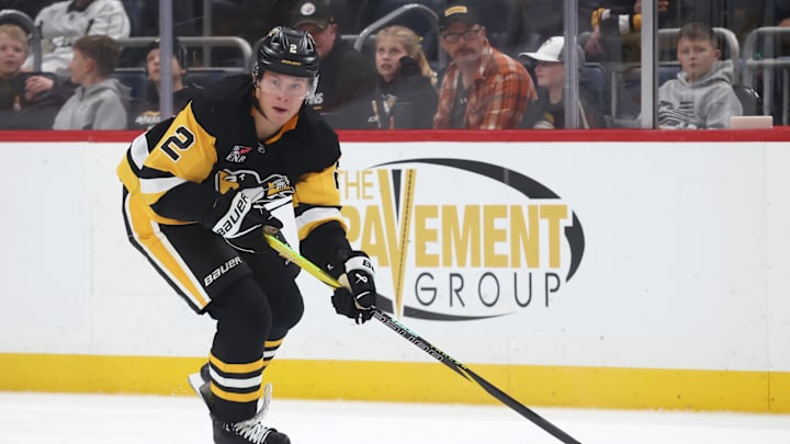 Dec 30, 2025; Pittsburgh, Pennsylvania, USA; Pittsburgh Penguins right wing Rutger McGroarty (2) skates up ice with the puck against the Carolina Hurricanes during the third period at PPG Paints Arena. Mandatory Credit: Charles LeClaire-Imagn Images