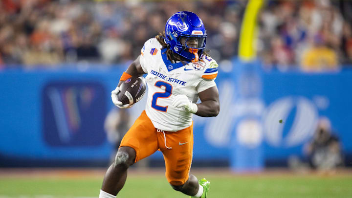 Dec 31, 2024; Glendale, AZ, USA; Boise State Broncos running back Ashton Jeanty (2) against the Penn State Nittany Lions during the Fiesta Bowl at State Farm Stadium. Mandatory Credit: Mark J. Rebilas-Imagn Images