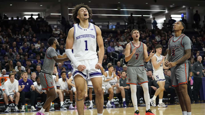 Nov 22, 2024; Evanston, Illinois, USA; Northwestern Wildcats guard Jalen Leach (1) celebrates a basket and being fouled against the Pepperdine Waves during the second half at Welsh-Ryan Arena. Mandatory Credit: David Banks-Imagn Images