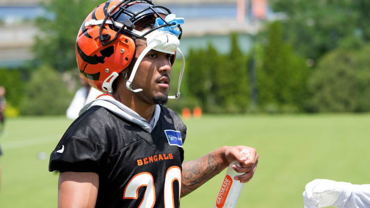 Cincinnati Bengals cornerback DJ Turner II (20) grabs a water at Bengals practice, Tuesday, June 4, 2024, in Cincinnati.