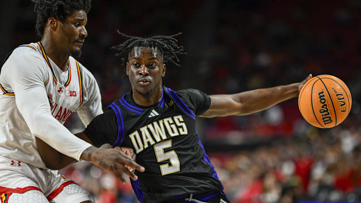 Washington is a road favorite against Rutgers on Tuesday night.