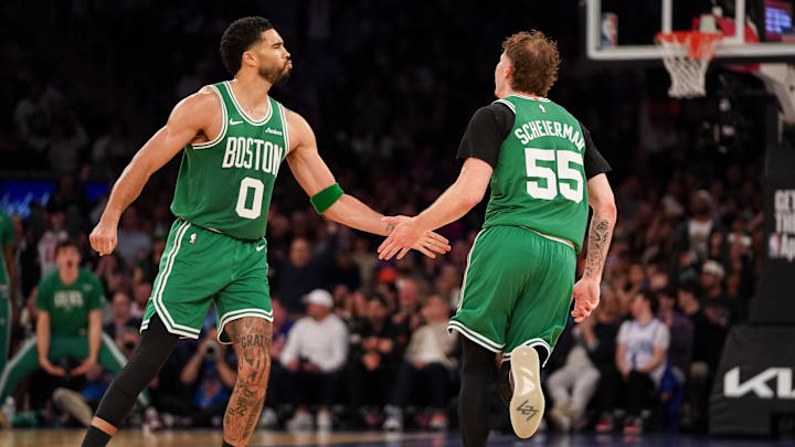 Apr 9, 2026; New York, New York, USA; Boston Celtics guard Baylor Scheierman (55) celebrates with Boston Celtics forward Jayson Tatum (0) after hitting a three pointer during the fourth quarter against the New York Knicks at Madison Square Garden. Mandatory Credit: Lucas Boland-Imagn Images