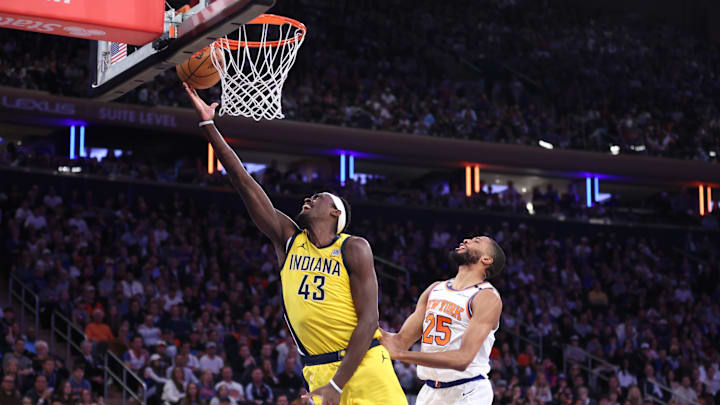 Indiana Pacers forward Pascal Siakam shoots against New York Knicks forward Mikal Bridges. Mandatory Credit: Wendell Cruz-Imagn Images