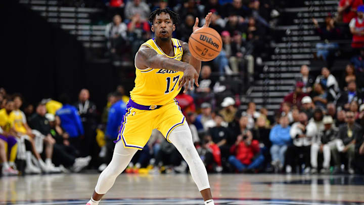 Feb 4, 2025; Inglewood, California, USA; Los Angeles Lakers forward Dorian Finney-Smith (17) passes the ball against the Los Angeles Clippers during the second half at Intuit Dome. Mandatory Credit: Gary A. Vasquez-Imagn Images