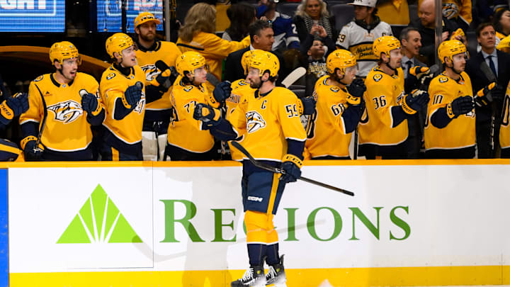 Nov 29, 2024; Nashville, Tennessee, USA; Nashville Predators defenseman Roman Josi (59) celebrates his goal with his teammates against the Tampa Bay Lightning during the first period at Bridgestone Arena. Mandatory Credit: Steve Roberts-Imagn Images Nov 29, 2024; Nashville, Tennessee, USA; Nashville Predators defenseman Roman Josi (59) celebrates his goal with his teammates against the Tampa Bay Lightning during the first period at Bridgestone Arena. Mandatory Credit: Steve Roberts-Imagn Images