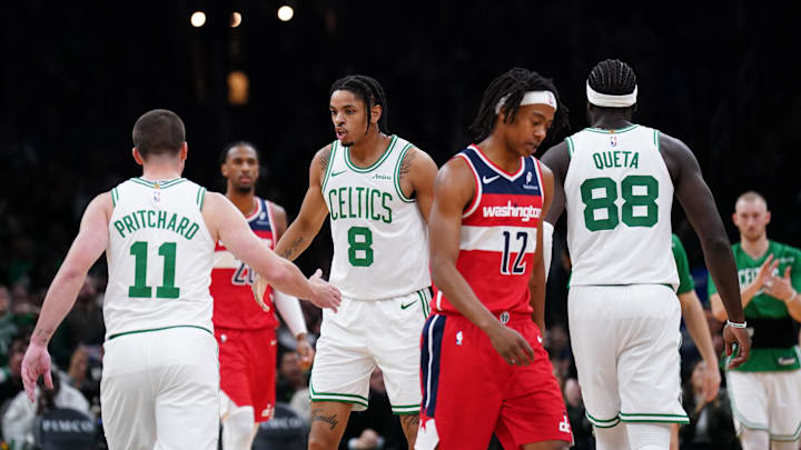 Nov 5, 2025; Boston, Massachusetts, USA; Boston Celtics forward Josh Minott (8) congratulates guard Payton Pritchard (11) after a play against the Washington Wizards in the second quarter at TD Garden. Mandatory Credit: David Butler II-Imagn Images