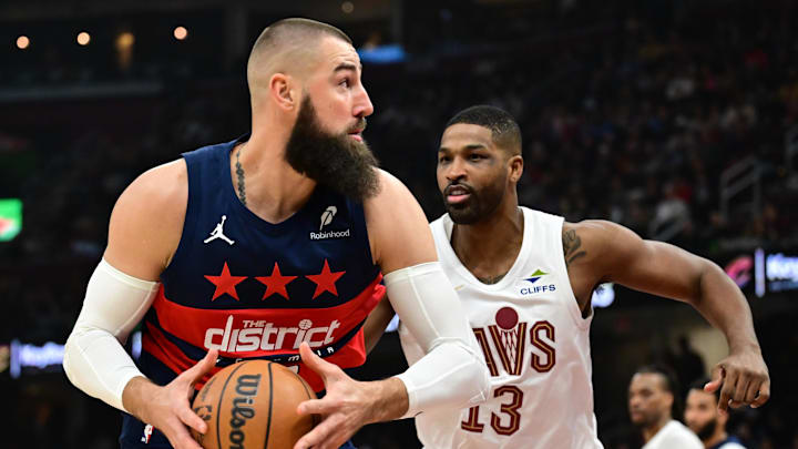 Dec 13, 2024; Cleveland, Ohio, USA; Washington Wizards center Jonas Valanciunas (17) drives to the basket against Cleveland Cavaliers center Tristan Thompson (13) during the first half at Rocket Mortgage FieldHouse. Mandatory Credit: Ken Blaze-Imagn Images