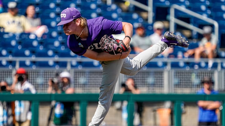 Jun 20, 2023; Omaha, NE, USA; TCU Horned Frogs pitcher Cohen Feser (28) strikes out the final Oral Roberts Golden Eagles batter to win the game at Charles Schwab Field Omaha. Mandatory Credit: Dylan Widger-Imagn Images