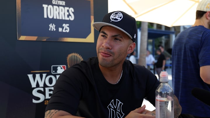 Oct 24, 2024; Los Angeles, CA, USA;  New York Yankees second base Gleyber Torres (25) speaks to media during workout day at Dodgers Stadium. Mandatory Credit: Kiyoshi Mio-Imagn Images