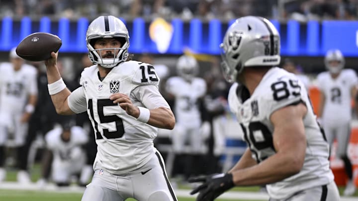 Oct 20, 2024; Inglewood, California, USA; Las Vegas Raiders quarterback Gardner Minshew (15) throws a pass to tight end Brock Bowers (89) during the second half against the Los Angeles Rams at SoFi Stadium. Mandatory Credit: Alex Gallardo-Imagn Images