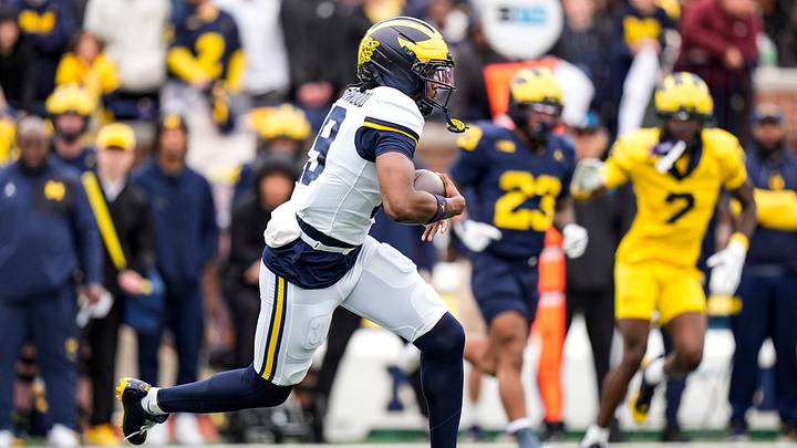 Michigan quarterback Bryce Underwood (19) keeps the ball for a run against Team Maize during the spring game at Michigan Stadium in Ann Arbor on Saturday, April 18, 2026. Michigan quarterback Bryce Underwood (19) keeps the ball for a run against Team Maize during the spring game at Michigan Stadium in Ann Arbor on Saturday, April 18, 2026.