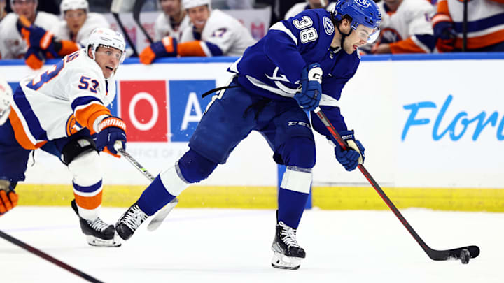 Oct 22, 2022; Tampa, Florida, USA; Tampa Bay Lightning left wing Brandon Hagel (38) skates with the Oct 22, 2022; Tampa, Florida, USA; Tampa Bay Lightning left wing Brandon Hagel (38) skates with the