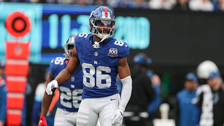 Dec 29, 2024; East Rutherford, New Jersey, USA; New York Giants wide receiver Darius Slayton (86) celebrates after scoring a touchdown reception during the first half against the Indianapolis Colts at MetLife Stadium. Mandatory Credit: Vincent Carchietta-Imagn Images