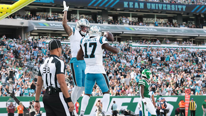 Oct 19, 2025; East Rutherford, New Jersey, USA; Carolina Panthers wide receiver Tetairoa McMillan (4) and wide receiver Xavier Legette (17) celebrate a touchdown in the second quarter against the New York Jets at MetLife Stadium. Mandatory Credit: Vincent Carchietta-Imagn Images Oct 19, 2025; East Rutherford, New Jersey, USA; Carolina Panthers wide receiver Tetairoa McMillan (4) and wide receiver Xavier Legette (17) celebrate a touchdown in the second quarter against the New York Jets at MetLife Stadium. Mandatory Credit: Vincent Carchietta-Imagn Images