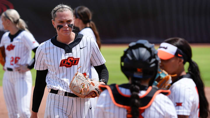Oklahoma State pitcher Ruby Meylan (66) walks to talk to teammates in the fifth inning of a Big 12 softball tournament game between the Oklahoma State Cowgirls and the Arizona State Sun Devils at Devon Park in Oklahoma City, Thursday, May 8, 2025.