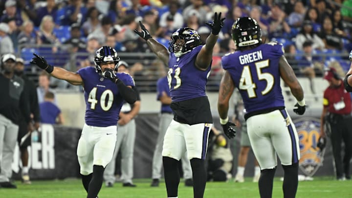 Aug 7, 2025; Baltimore, Maryland, USA; Baltimore Ravens defensive tackle Aeneas Peebles (93) celebrates after batting down a pass at the line of scrimmage against the Indianapolis Colts during the third quarter at M&T Bank Stadium. Mandatory Credit: Rafael Suanes-Imagn Images
