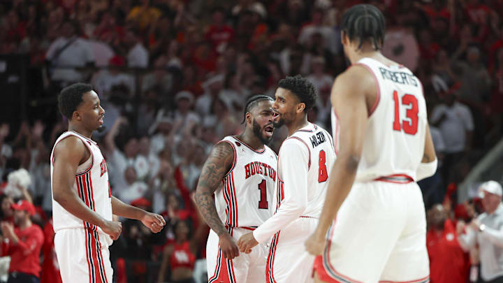 Feb 19, 2024; Houston, Texas, USA; Houston Cougars guard Mylik Wilson (8) celebrates with guard