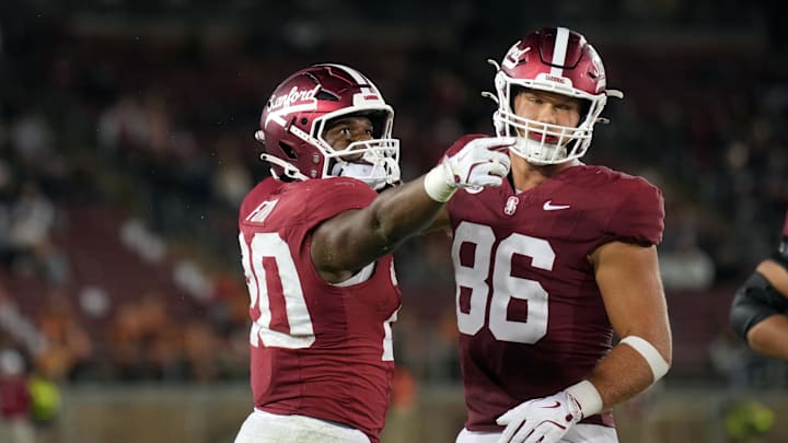 Sep 13, 2025; Stanford, California, USA; Stanford Cardinal running back Micah Ford (left) gestures with tight end Sam Roush (86) after carrying the ball for a first down against the Boston College Eagles during the fourth quarter at Stanford Stadium. Mandatory Credit: Darren Yamashita-Imagn Images Sep 13, 2025; Stanford, California, USA; Stanford Cardinal running back Micah Ford (left) gestures with tight end Sam Roush (86) after carrying the ball for a first down against the Boston College Eagles during the fourth quarter at Stanford Stadium. Mandatory Credit: Darren Yamashita-Imagn Images