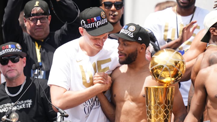 Jun 15, 2023; Denver, CO, USA; Denver Nuggets center Nikola Jokic (15) and Denver Nuggets forward Bruce Brown (11) during the championship parade after the Denver Nuggets won the 2023 NBA Finals. Jun 15, 2023; Denver, CO, USA; Denver Nuggets center Nikola Jokic (15) and Denver Nuggets forward Bruce Brown (11) during the championship parade after the Denver Nuggets won the 2023 NBA Finals.