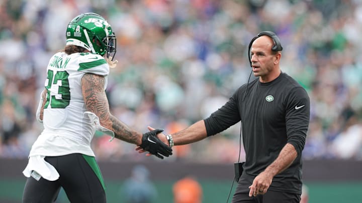 Nov 6, 2022; East Rutherford, New Jersey, USA; New York Jets head coach Robert Saleh slaps hands with tight end Tyler Conklin (83) after a Jets touchdown  during the second half against the Buffalo Bills at MetLife Stadium. Mandatory Credit: Vincent Carchietta-Imagn Images