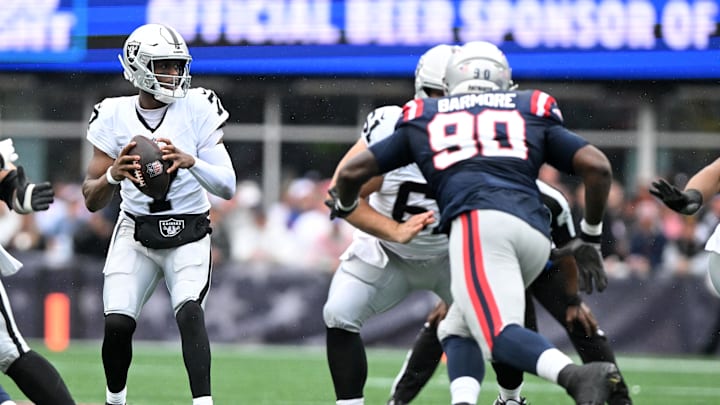 Sep 7, 2025; Foxborough, Massachusetts, USA; Las Vegas Raiders quarterback Geno Smith (7) drops back to pass against the New England Patriots during the first half at Gillette Stadium. Mandatory Credit: Brian Fluharty-Imagn Images