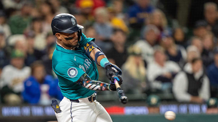 Seattle Mariners centerfielder Julio Rodriguez (44) hits a single during the fifth inning at T-Mobile Park in 2024.