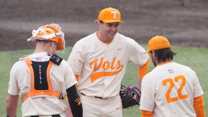 Tennessee pitcher Austin Breedlove is approached by Tony Vitello and Stone Lawless during an NCAA college baseball game against St. Bonaventure on Sunday, March 9, 2025, in Knoxville, Tenn.