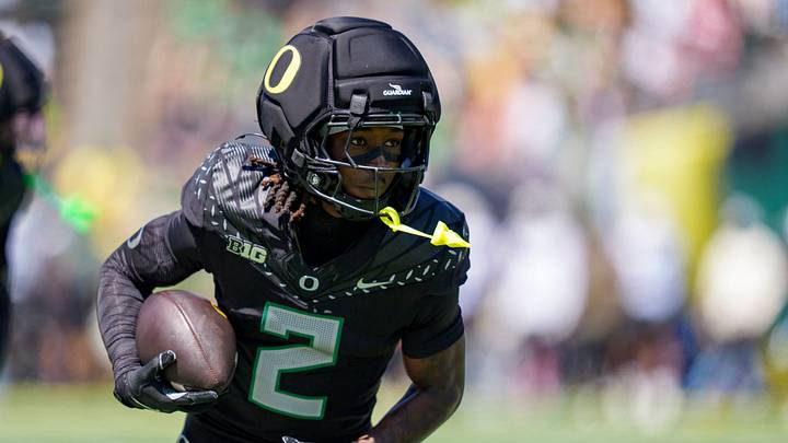 Combat Ducks wide receiver Iverson Hooks carries the ball during warmups during the Oregon Ducks annual spring game on April 25, 2026 at Autzen Stadium in Eugene, Oregon.