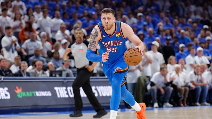 May 20, 2026; Oklahoma City, Oklahoma, USA; Oklahoma City Thunder center Isaiah Hartenstein (55) dribbles the ball and looks to pass during the fourth quarter against the San Antonio Spurs during game two of the western conference finals for the 2026 NBA playoffs at Paycom Center.