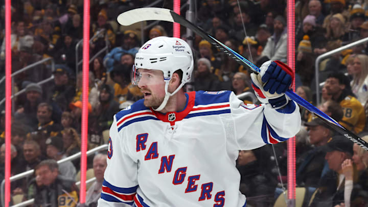 Jan 31, 2026; Pittsburgh, Pennsylvania, USA;  New York Rangers left wing Alexis Lafreniere (13) celebrates his power play goal against the Pittsburgh Penguins during the second period at PPG Paints Arena. Mandatory Credit: Charles LeClaire-Imagn Images
