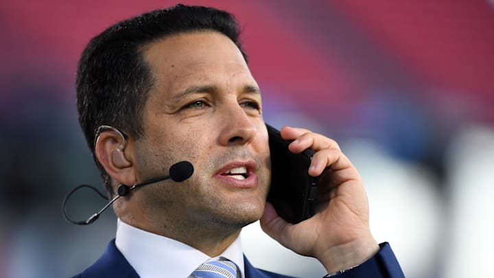 Oct 18, 2021; Nashville, Tennessee, USA; ESPN NFL Insider Adam Schefter talks on his phone before the Monday Night Football game between the Tennessee Titans and the Buffalo Bills at Nissan Stadium. Mandatory Credit: Christopher Hanewinckel-Imagn Images