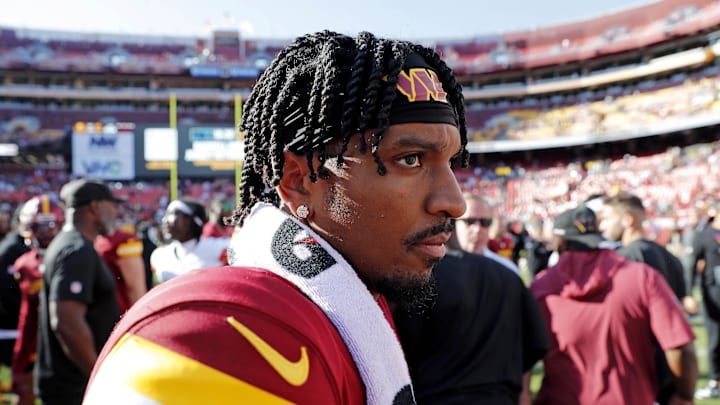 Oct 6, 2024; Landover, Maryland, USA; Washington Commanders quarterback Jayden Daniels (5) walks off the field after defeating the Cleveland Browns at NorthWest Stadium. Mandatory Credit: Peter Casey-Imagn Images