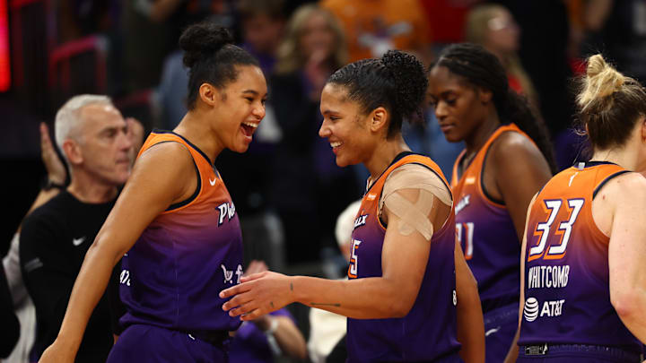 Aug 7, 2025; Phoenix, Arizona, USA; Phoenix Mercury forward Alyssa Thomas (right) celebrates with Satou Sabally after becoming the first player in WNBA history to record three triple doubles in a row against the Indiana Fever at PHX Arena. Mandatory Credit: Mark J. Rebilas-Imagn Images

