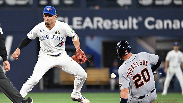 Sep 15, 2026; Toronto, Ontario, CAN;  Detroit Tigers first baseman Spencer Torkleson (20) steals second base as Toronto Blue Jays shortstop Andres Gimenez (0) misses the ball in the sixth inning at Rogers Centre.  Mandatory Credit: Dan Hamilton-Imagn Images