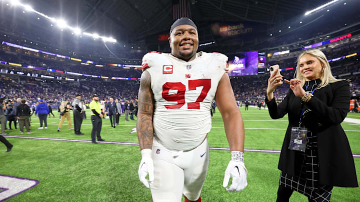 Jan 15, 2023; Minneapolis, Minnesota, USA; New York Giants defensive tackle Dexter Lawrence (97) reacts after winning a wild card game against the Minnesota Vikings at U.S. Bank Stadium. Mandatory Credit: Matt Krohn-Imagn Images