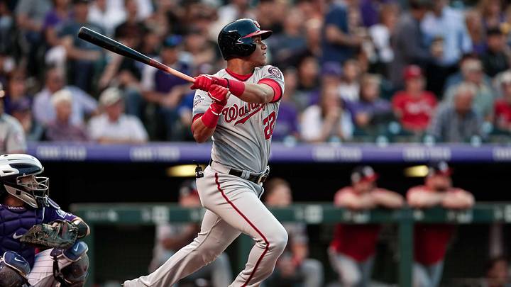 Sep 29, 2018; Denver, CO, USA; Washington Nationals left fielder Juan Soto (22) watches his ball on a two RBI double in the first inning against the Colorado Rockies at Coors Field. Mandatory Credit: Isaiah J. Downing-Imagn Images