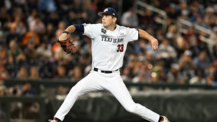 Jun 15, 2024; Omaha, NE, USA;  Texas A&M Aggies starting pitcher Justin Lamkin (33) throws against the Florida Gators during the first inning at Charles Schwab Field Omaha. Mandatory Credit: Steven Branscombe-Imagn Images