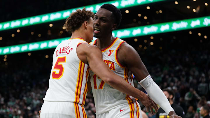 Nov 12, 2024; Boston, Massachusetts, USA; Atlanta Hawks guard Dyson Daniels (5) and forward Onyeka Okongwu (17) react after defeating the Boston Celtics at TD Garden. Mandatory Credit: David Butler II-Imagn Images