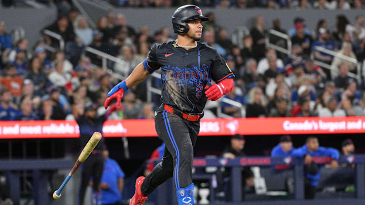 Toronto Blue Jays center fielder Jonatan Clase (8) hits a two-run home run against the Boston Red Sox in the seventh inning at Rogers Centre on Sept 25. Toronto Blue Jays center fielder Jonatan Clase (8) hits a two-run home run against the Boston Red Sox in the seventh inning at Rogers Centre on Sept 25.