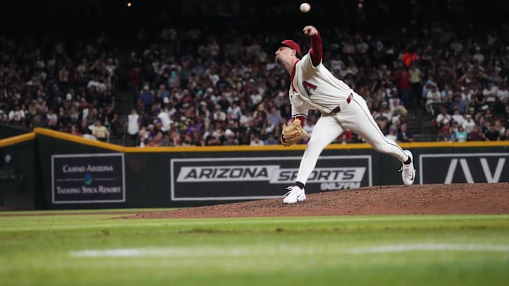 Arizona Diamondbacks Kyle Nelson (24) pitches against the Colorado Rockies on Opening Day at Chase Field. Arizona Diamondbacks Kyle Nelson (24) pitches against the Colorado Rockies on Opening Day at Chase Field.